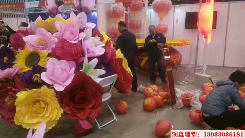 玻璃钢花篮雕塑里面的花朵是什么花-绢花-仿真花朵拼接花篮